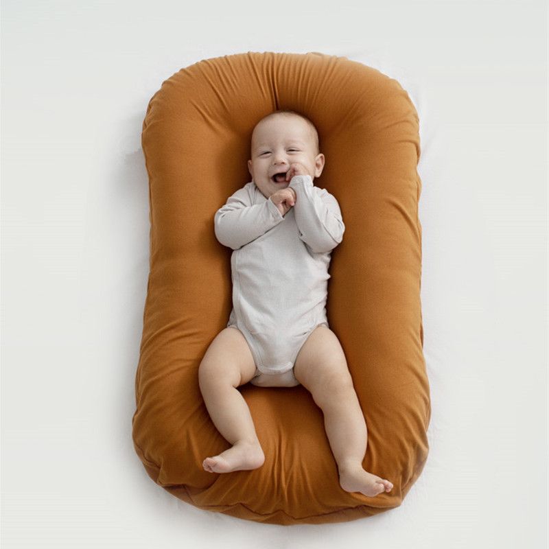 Reducteur lit bebe - Biomimétique - Univers du Sommeil Bébé