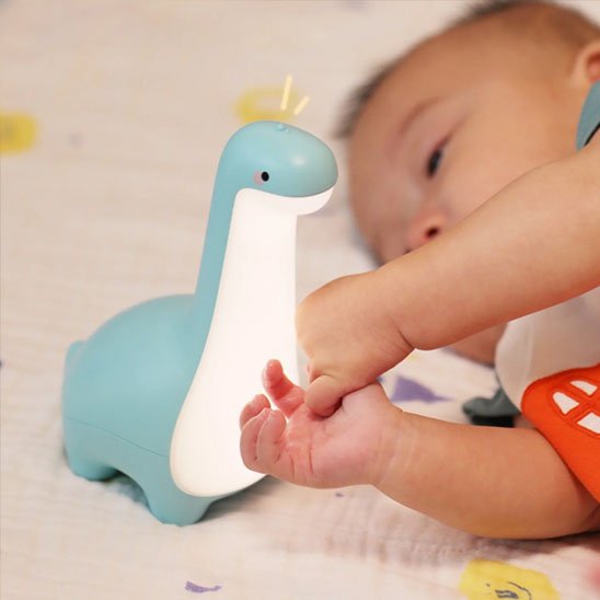 Veilleuse bébé dinosaure | DinoGlow - Univers du Sommeil Bébé