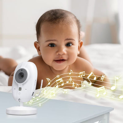 abyphone blanc compact diffusant des berceuses apaisantes pour un bébé paisiblement endormi dans son lit, garantissant un sommeil sûr et surveillé.