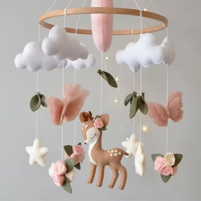 Hochet mobile pour bébé fille avec des petites clochettes stimulantes pour l'éveil.