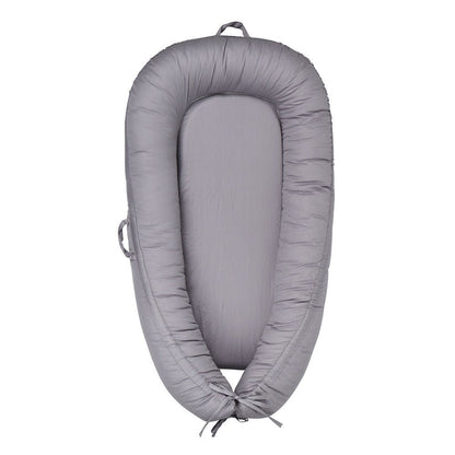 Réducteur de Lit Bébé Cocon Douillet - Univers du Sommeil Bébé