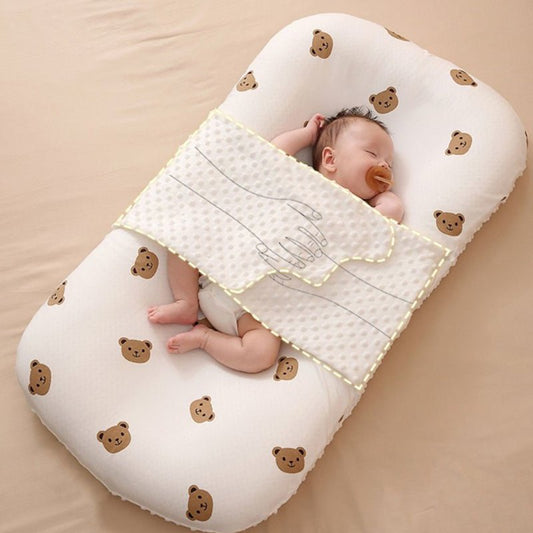 Reducteur de lit bionique pour nouveau - né - Univers du Sommeil Bébé