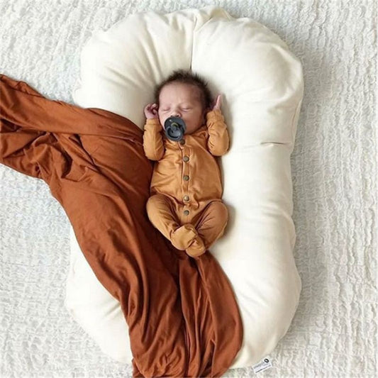 Reducteur lit bebe - Biomimétique - Univers du Sommeil Bébé